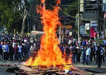 Army conducts flag march in Guwahati as Assam burns
