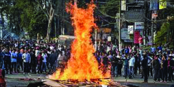 Army conducts flag march in Guwahati as Assam burns