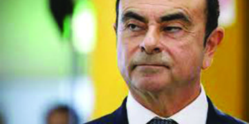 Out on bail, former boss of Nissan flees Japan