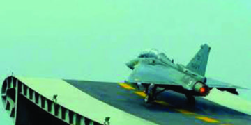 Naval version of Tejas LCA lands on INS Vikramaditya for first time