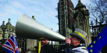 UK to celebrate Brexit, but warns biz may suffer