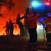 Thousands of tourists flee Australia bushfires