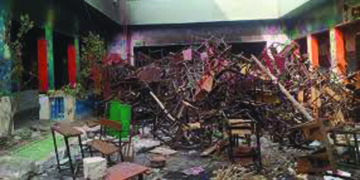 Mob slid down ropes into a school, burnt and used it as base for attacks