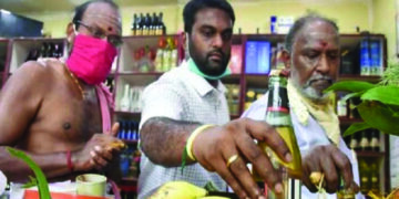 Liquor sales resume in Puducherry after two months; tipplers throng in large number to outlets