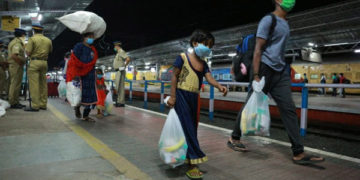 Dial 079-23251900, get passes: 3 spl trains with migrants to leave for UP and Odisha from Ahmedabad, Surat stations