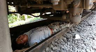 Diamond trader jumps in front of train, kills self after testing COVID-19 positive in Surat