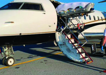 Plane carrying comatose Russian dissident lands in Germany