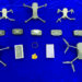 Drones, iPhones, gold seized at airport; one held