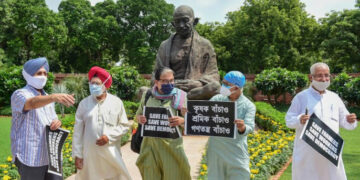 Opposition parties conduct silent protest march in Parliament over farm Bills