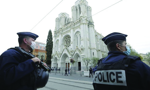 3 dead in church attack, plunging France into dual emergency