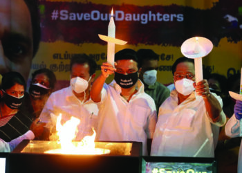 DMK MP Kanimozhi leads candle light march over Hathras incident