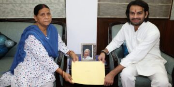 Tej Pratap Yadav receives RJD symbol from mother Rabri Devi