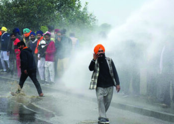 Protest against farm laws: Delhi Police uses tear gas, water cannons to push back farmers
