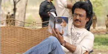 Superstar compliments Dr HV Hande for presenting a book on MGR