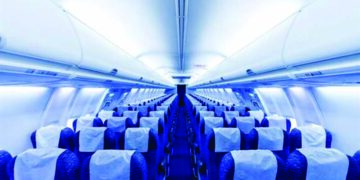 Empty middle seats may reduce COVID-19 exposure on flights, says a lab study