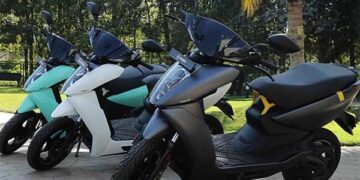Co-founder of Ather Energy presents first Ather 450X to Hero MotoCorp chief Dr Munjal