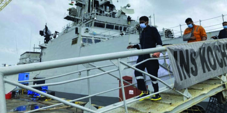 INS Kochi brings 125 rescuees from barge P305 to Mumbai