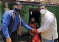 Two Good Samaritans distribute food kits, sanitizers & mask to the needy in Sarkhej