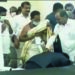 Throwing all norms Dist Collector falls at KCR’s feet in Telangana, Opposition parties castigate him