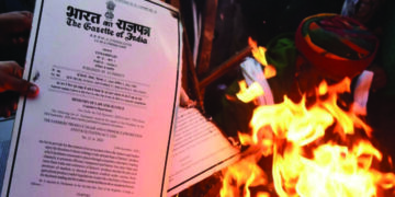TN farmers burn copies of 3 farm laws, demand their repeal