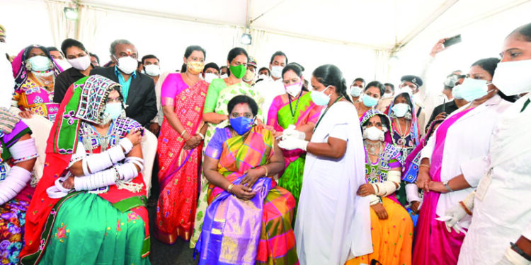 Telangana Governor Tamilisai takes COVID-19 vaccine among tribals