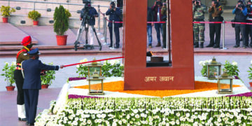 Amar Jawan Jyoti at India Gate merged with National War Memorial flame in full military tradition