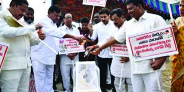 ‘High spirit’ protest: TDP legislators wash Andhra Pradesh CM’s portrait with liquor