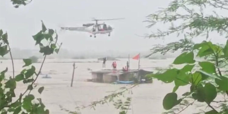 Indian Coast Guard helicopter rescues 16 stranded along banks of river Ambika near Valsad