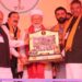 Upcoming ‘Dhaman’ movie producer Bhupat Bodar presents memento to PM Modi in Dhoraji