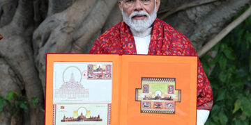 PM Modi releases commemorative postage stamps on Ram temple