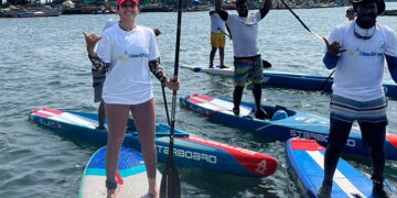 Regina Cassandra champions plastic-free oceans through paddle-boarding!