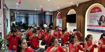 IYD feat: Students of Red & White Institute perform yoga postures on the longest day of the year