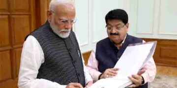 Rajya Sabha MP Parimal Nathwani presents his new book ‘Call of the Gir’ to PM Modi